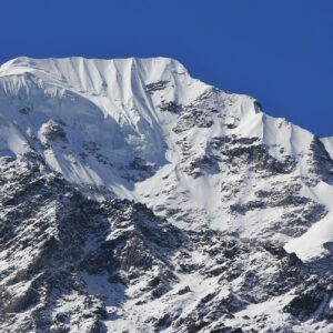 Mountain peak of Naya Kanga covered by thil glacier and snow. View from Kyanjin Gumba, Langtang National Park, Nepal.