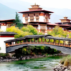 Punakha Dzong in Bhutan with traditional bridge and riverside setting under clear sky