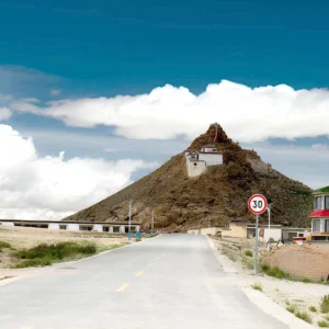 Chiu Monastery overlooking Lake Manasarovar in Tibet, a sacred hilltop monastery with panoramic views of the holy lake and surrounding Himalayan landscape.