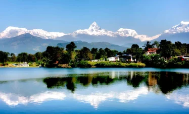 Phewa Lake in Pokhara with reflection of Fishtail Mountain Machhapuchhre and Annapurna range