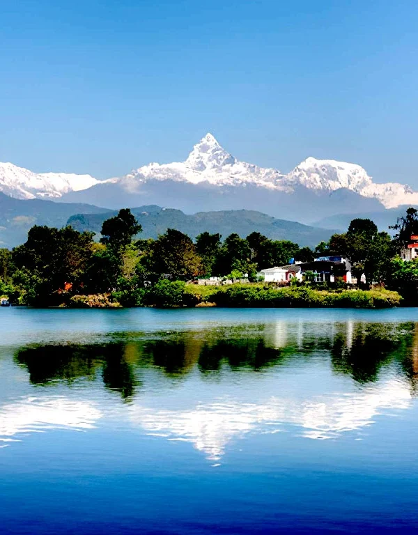 Phewa Lake in Pokhara with reflection of Fishtail Mountain Machhapuchhre and Annapurna range