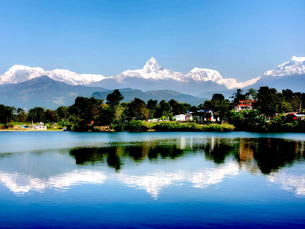 Phewa Lake in Pokhara with reflection of Fishtail Mountain Machhapuchhre and Annapurna range