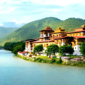 Punakha Dzong monastery in Bhutan located between Pho Chhu and Mo Chhu rivers with Himalayan hills