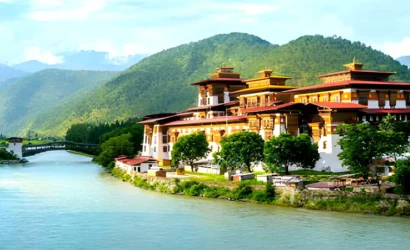 Punakha Dzong monastery in Bhutan located between Pho Chhu and Mo Chhu rivers with Himalayan hills