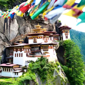 Taktsang Palphug Tiger’s Nest Monastery in Paro Bhutan built on a cliff with prayer flags