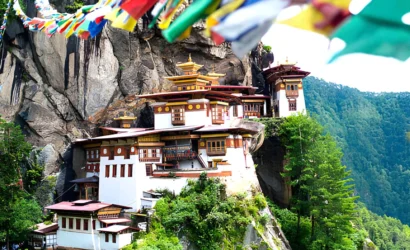 Taktsang Palphug Tiger’s Nest Monastery in Paro Bhutan built on a cliff with prayer flags