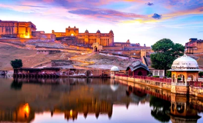 Amber Fort in Jaipur reflected in Maota Lake at sunset, Rajasthan, India