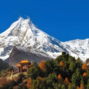 Beautiful peak Manaslu in the autumn Himalaya mountains in Nepal with a Buddhist monastery at the foot