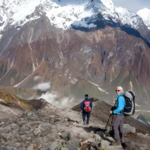 Trekker on the way to the valley covered with cloud on Manaslu circuit trek in Nepal